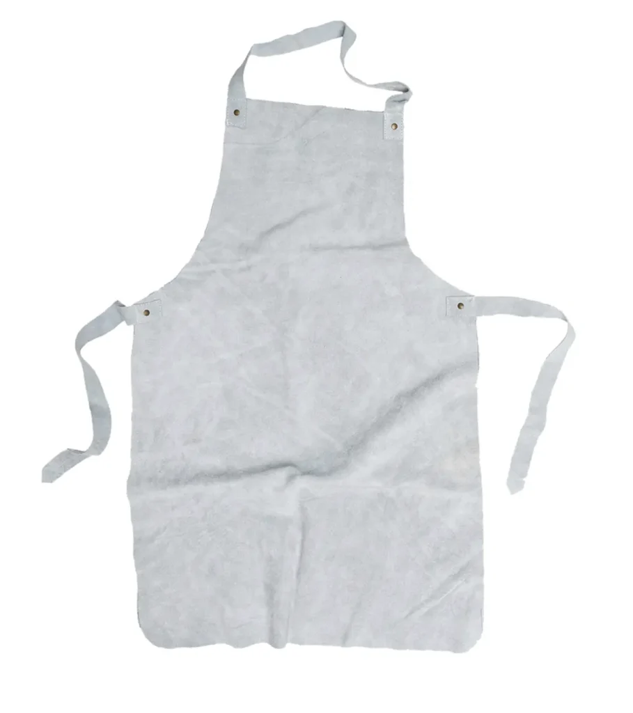 A full-length shot of a heavy-duty, grey leather apron The apron features adjustable buckles, cross-back straps